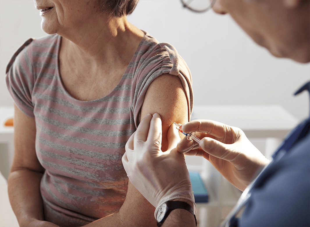 Woman receiving an injection