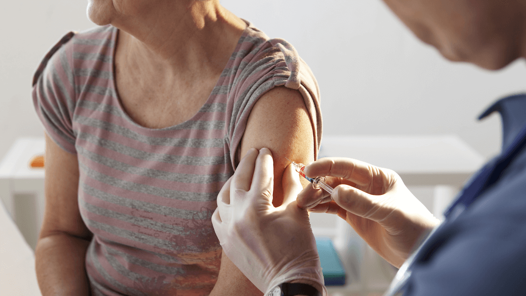 Woman receiving an injection